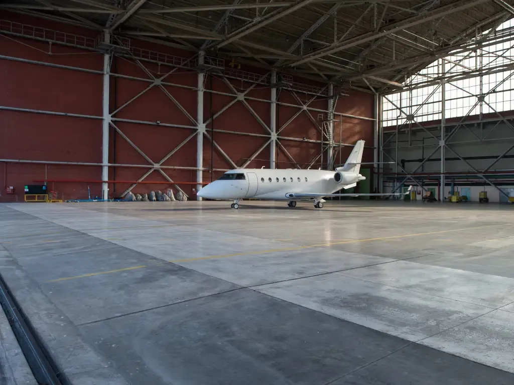 Red Iron Steel Aircraft Hangars image
