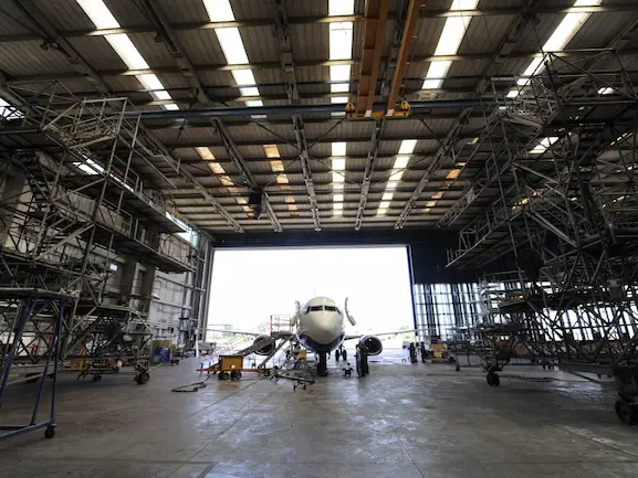 Red Iron Steel Aircraft Hangars image